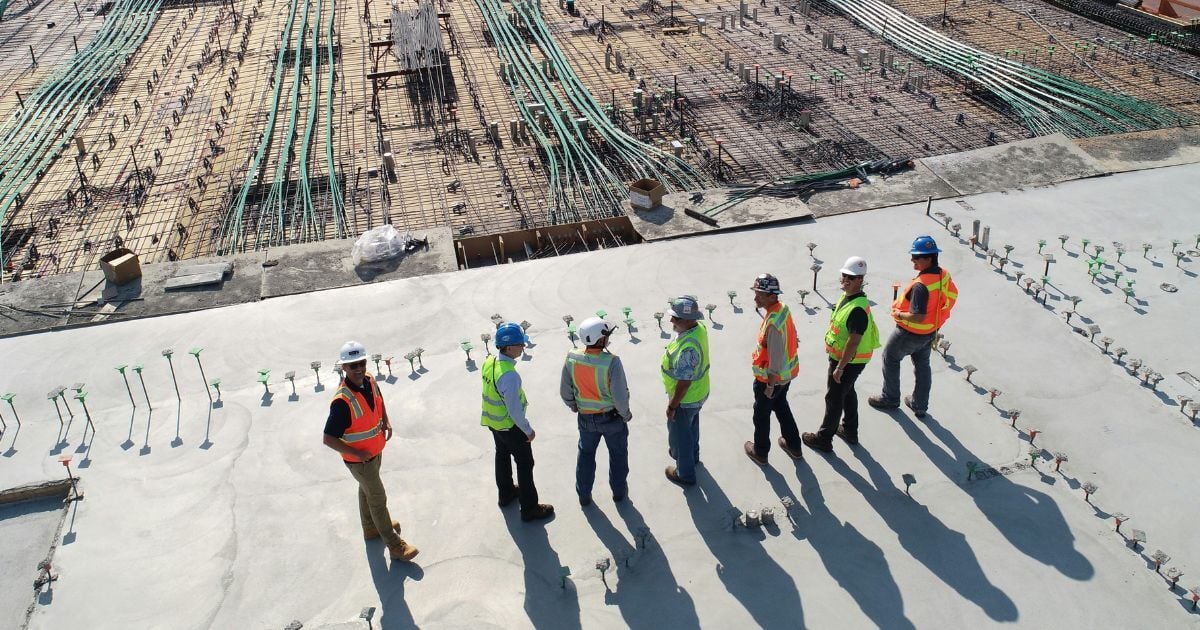 7 Construction workers at a job site