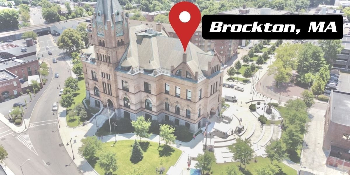 Brockton Town Hall with a marker saying Brockton, MA