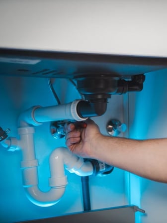 Hand fixing under a sink