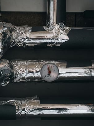 Insulated HVAC pipes representing an HVAC system and it's schedule