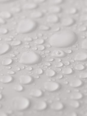 Water droplets on a surface representing indoor air quality and humidity in a commercial building.