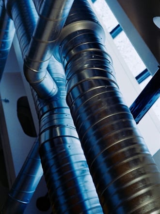 HVAC piping in a large commercial HVAC building