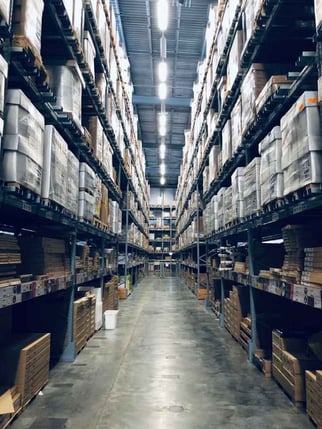 Large warehouse representing a commercial building that may have higher pricing due to size