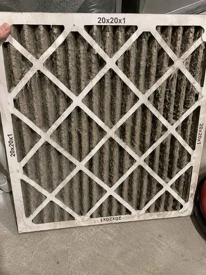 Dirty HVAC air filter that's putting strain on the compressor