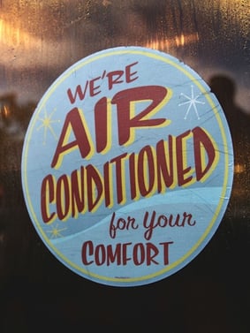 Air conditioning sign on the front of a commercial building 