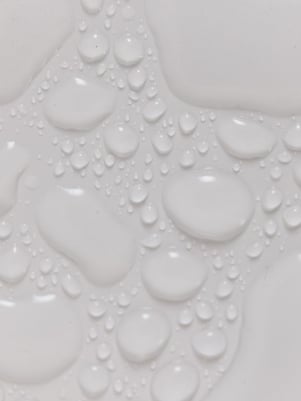 Water droplets representing the moisture that would form within an apartment building without proper ventilation.