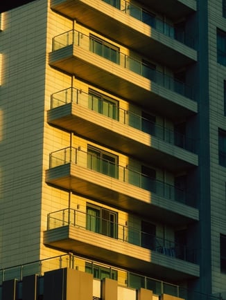 Apartment building from an outside view showing the kind of building that would need to be serviced by a commercial HVAC company
