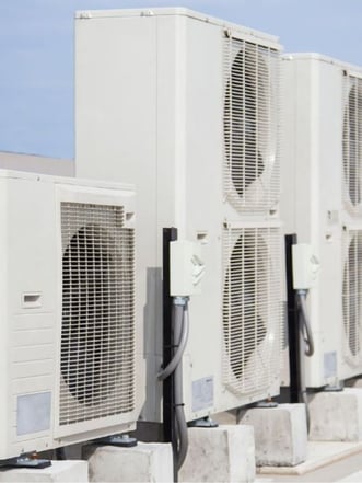 Large commercial HVAC rooftop system representing a larger more complex system